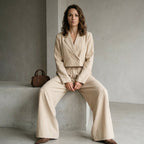 Professional e-commerce fashion photography — create a realistic product-on-model shot using the provided reference images. You are given 6 images: image 1 = product reference, image 2 = product reference, image 3 = product reference, image 4 = product reference, image 5 = product reference, image 6 = model reference. Dress the model from the sixth image in the product from the product images (images 1, 2, 3, 4, 5). The product must be physically placed on the model's body — worn naturally with correct fit,