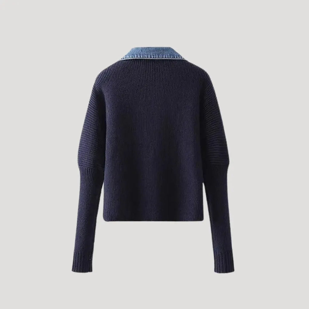 Navy knitted cardigan with a denim collar and ribbed cuffs.