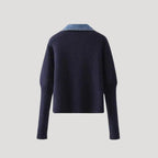 Navy knitted cardigan with a denim collar and ribbed cuffs.
