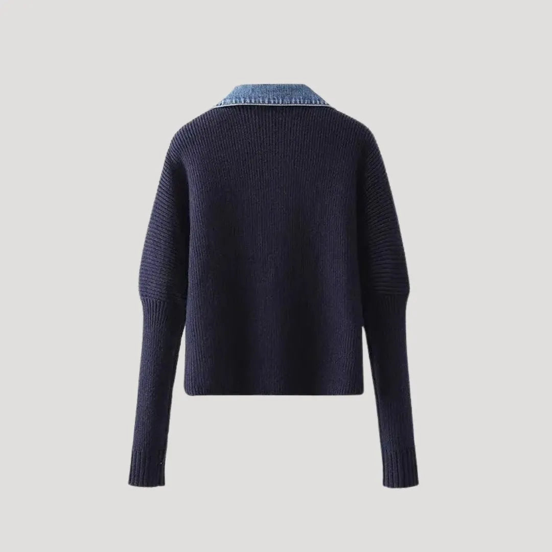 Navy knitted cardigan with a denim collar and ribbed cuffs.