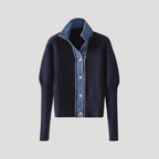 Navy knit cardigan with denim collar and button closure.
