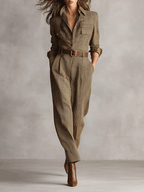 Brown plaid wool-blend women's jumpsuit with a belted waist, pockets, and collared long sleeves.