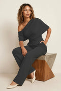 Jumpsuit one-shoulder zwart draperende halslijn - Miss Madera MIS-C1D170