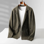 Donkergroene double-breasted damesblazer van 100% gekamde cashmere met getailleerde pasvorm en zakken.