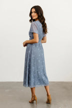 Women's dress blue floral overlay side view