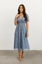 Women's dress blue floral overlay front pose