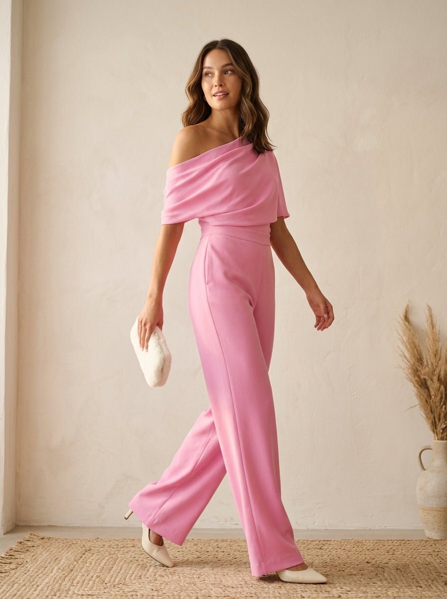 Jumpsuit roze met wijde pijpen en asymmetrische hals - Miss Madera